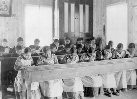 A historical classroom at Fort Resolution residential school — system context