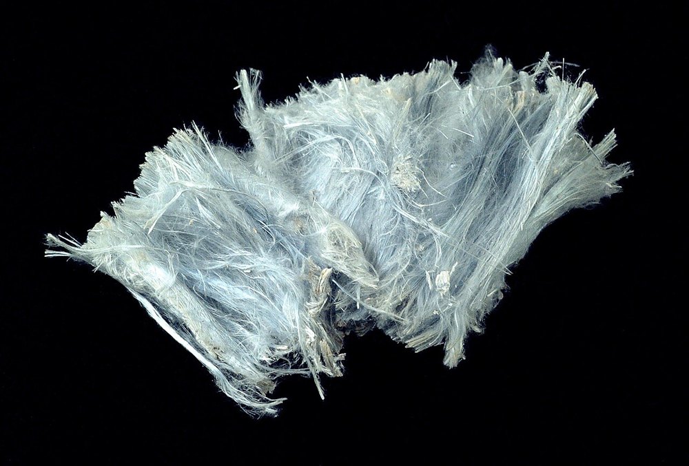 Crocidolite mineral specimen — the asbestos type used in the original filter